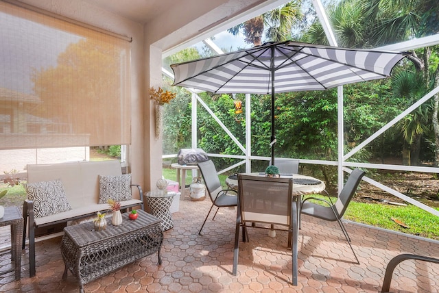 8228 Brindisi Ln, Boynton Beach, FL 33472 - sunroom featuring outdoor dining area and an outdoor living space
