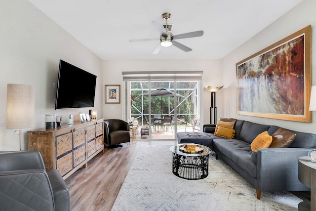 8228 Brindisi Ln, Boynton Beach, FL 33472 - living area with wood finished floors and ceiling fan