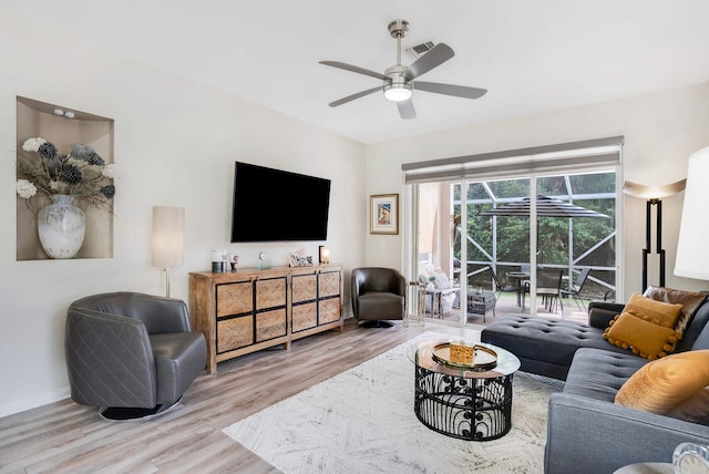 8228 Brindisi Ln, Boynton Beach, FL 33472 - living room featuring a ceiling fan, wood finished floors, and baseboards