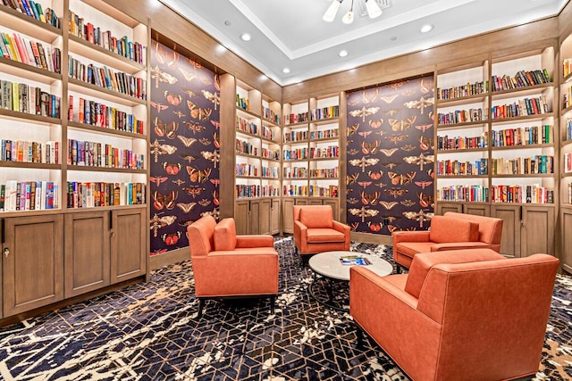 8228 Brindisi Ln, Boynton Beach, FL 33472 - sitting room with bookshelves, recessed lighting, and built in features