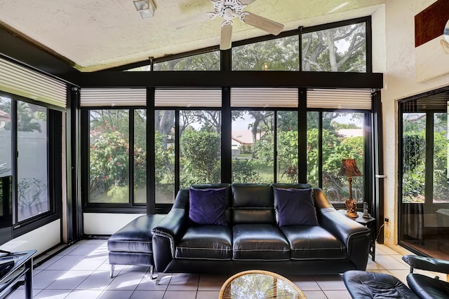 unfurnished sunroom featuring lofted ceiling and a healthy amount of sunlight