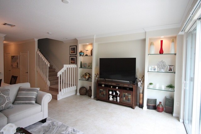 living room featuring crown molding