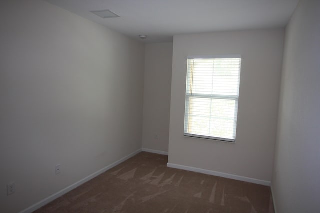 5946 Monterra Club Dr, Lake Worth, FL 33463 - carpeted empty room with visible vents and baseboards