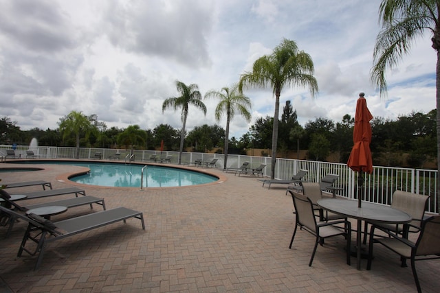 5946 Monterra Club Dr, Lake Worth, FL 33463 - pool featuring a patio and fence
