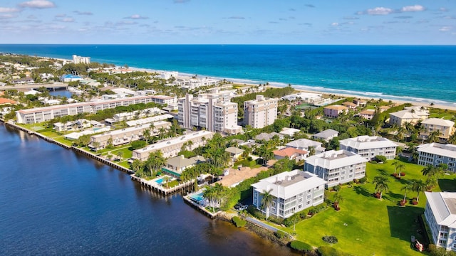 aerial view with a beach view and a water view