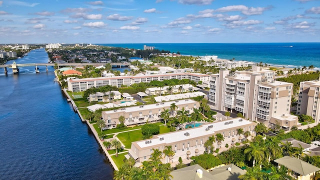 birds eye view of property featuring a water view