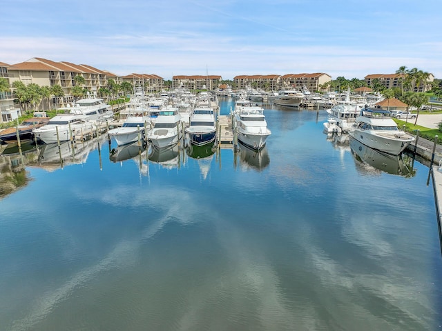 dock area with a water view and view of marina