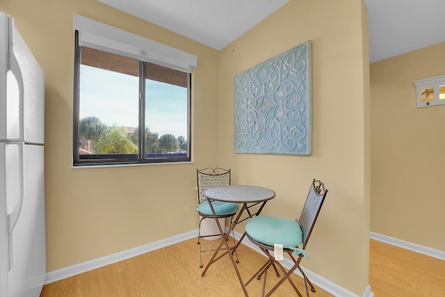 dining space featuring light wood-type flooring