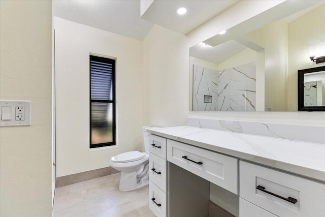 bathroom featuring walk in shower, vanity, and toilet