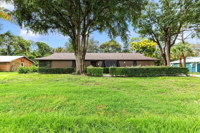 exterior space with a front lawn