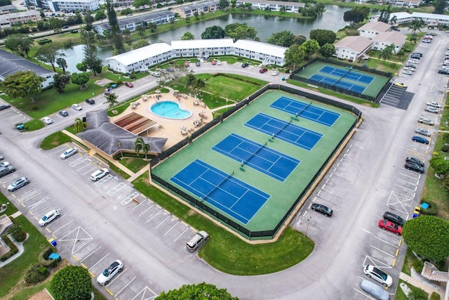 birds eye view of property featuring a water view