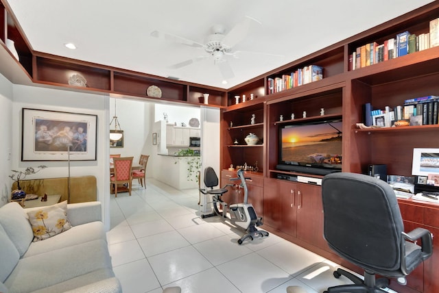 tiled office space with ceiling fan