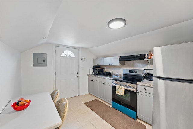 kitchen with stainless steel appliances, lofted ceiling, electric panel, extractor fan, and sink