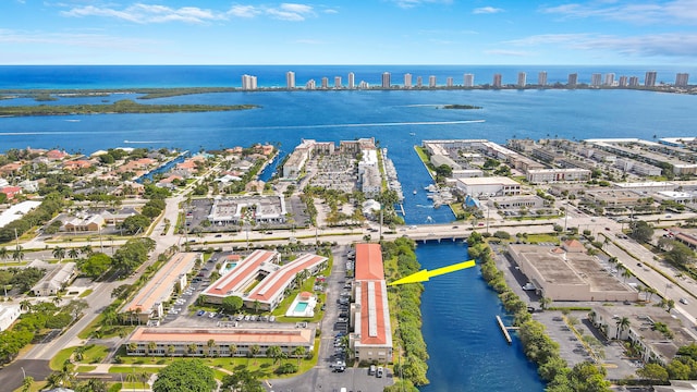 birds eye view of property featuring a water view