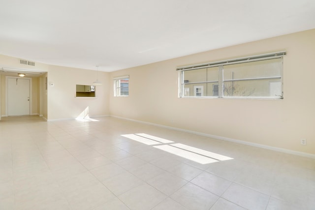 view of tiled spare room