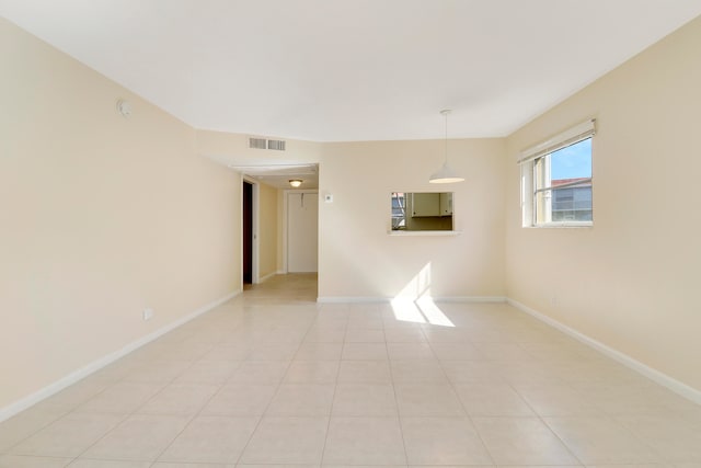 view of tiled spare room