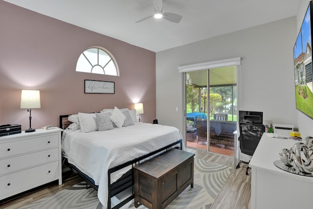 bedroom featuring light hardwood / wood-style flooring, access to outside, and ceiling fan