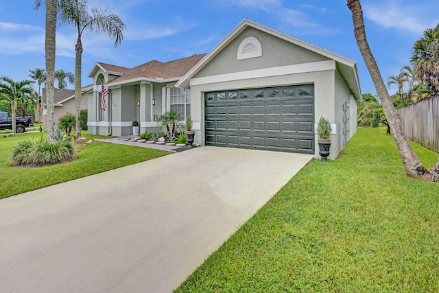 ranch-style house with a garage and a front yard