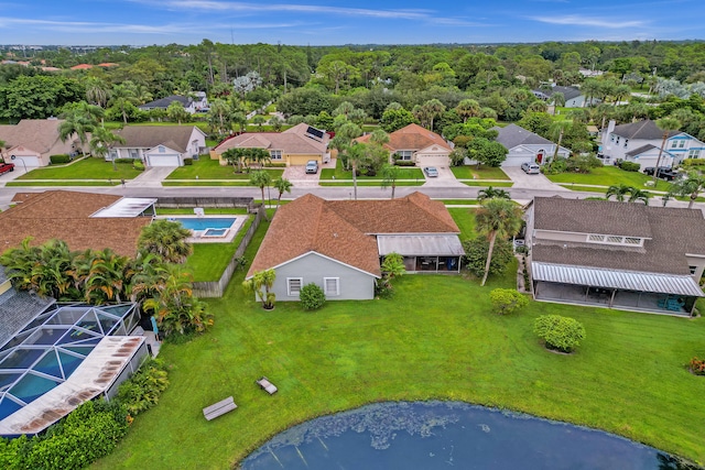 bird's eye view with a water view