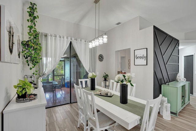 dining area with light hardwood / wood-style flooring