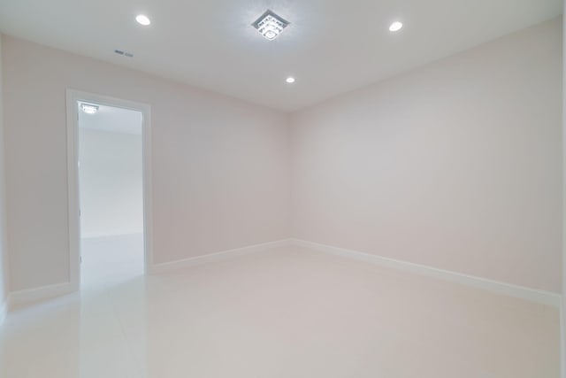 empty room featuring light tile patterned floors