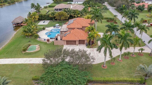 bird's eye view with a water view