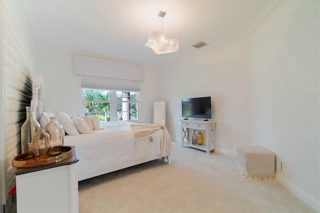 carpeted bedroom with crown molding and an inviting chandelier