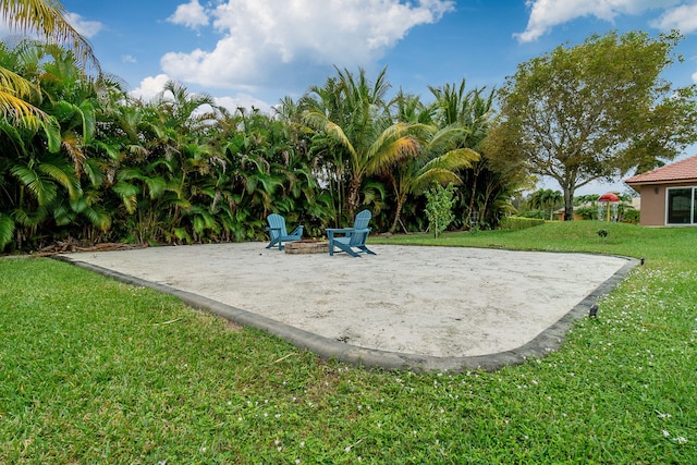 view of patio with an outdoor fire pit