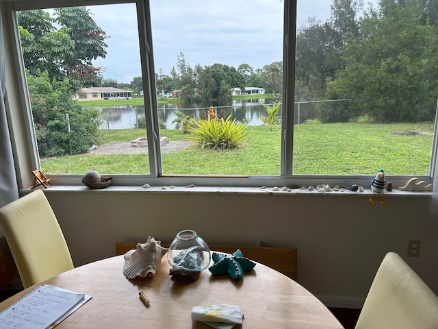 dining room with a water view