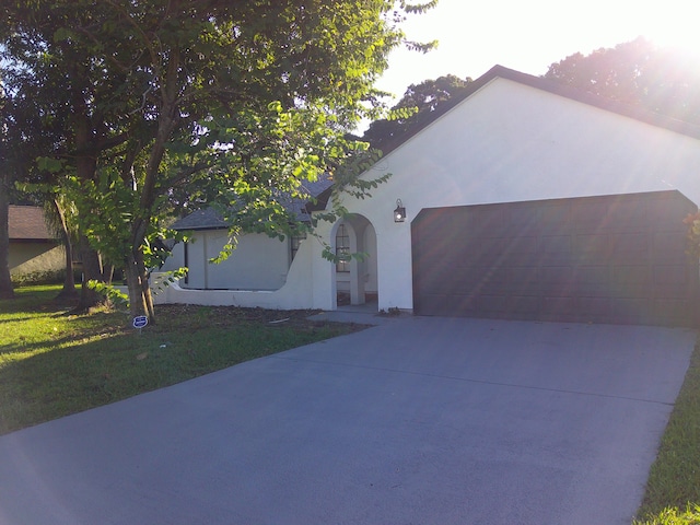 view of front of home with a garage