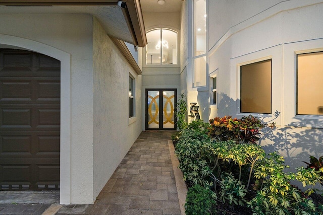 property entrance featuring french doors