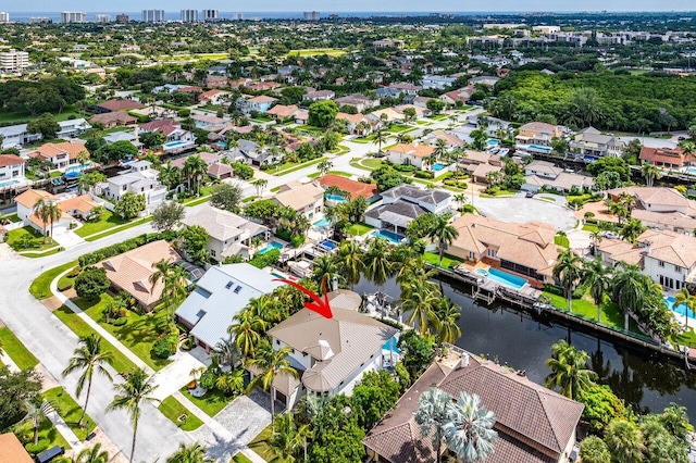 drone / aerial view featuring a water view