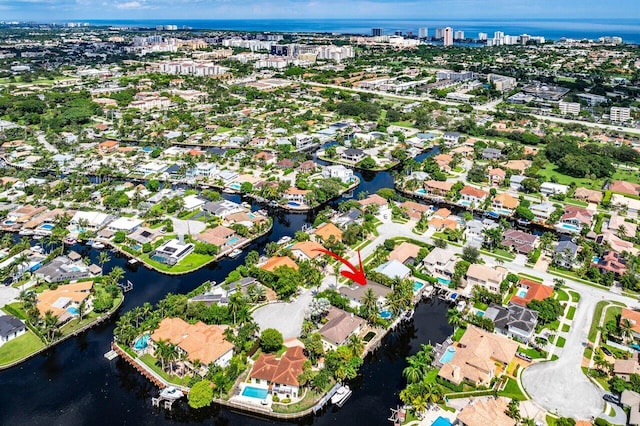 drone / aerial view with a water view