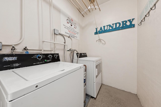 laundry area with washing machine and dryer and laundry area