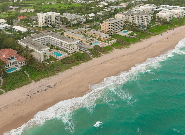 aerial view with a view of city, a water view, and a view of the beach