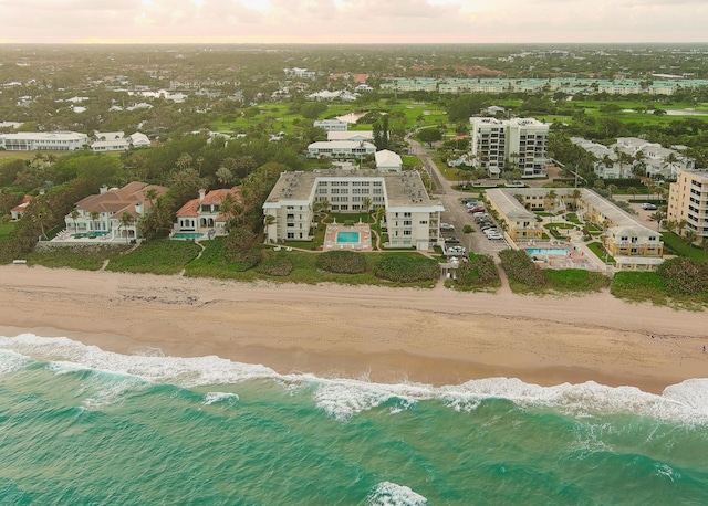 aerial view featuring a water view and a view of the beach