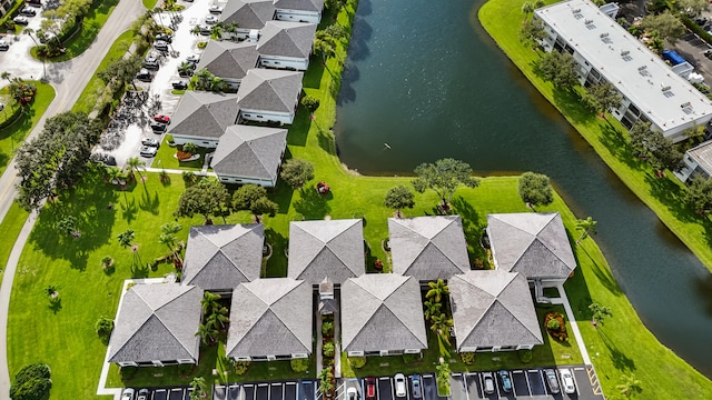 drone / aerial view with a water view