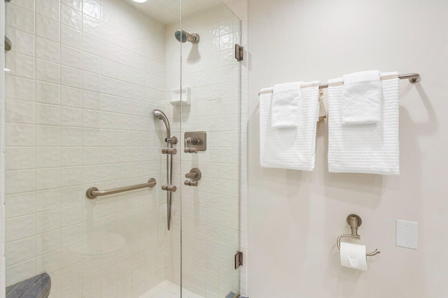 bathroom with an enclosed shower