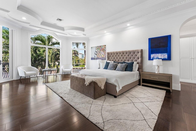 bedroom featuring access to exterior, multiple windows, and crown molding