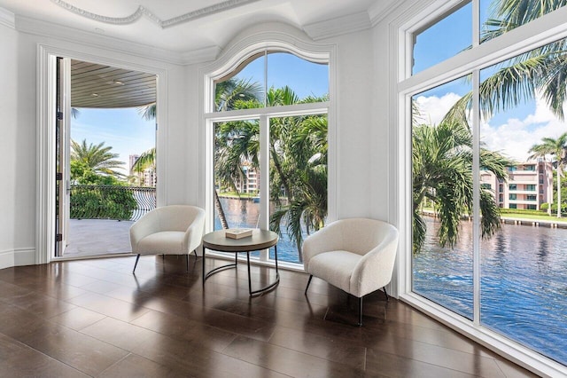 living area featuring a water view