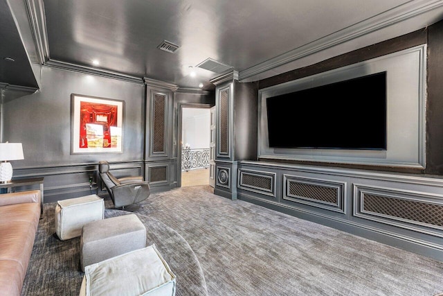 home theater with carpet and crown molding