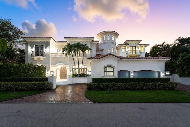 mediterranean / spanish house with a balcony