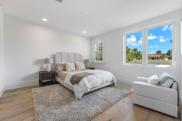 bedroom featuring light hardwood / wood-style floors