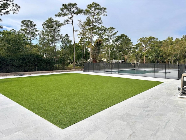 12850 152nd St N, Jupiter, FL 33478 - exterior space with a fenced in pool, fence, and a yard
