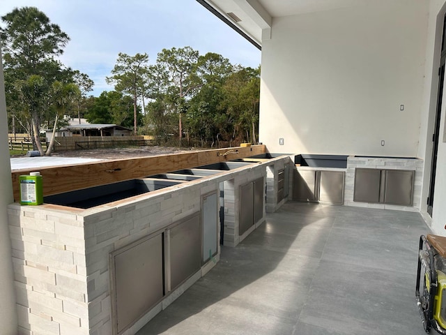 12850 152nd St N, Jupiter, FL 33478 - view of patio with exterior kitchen
