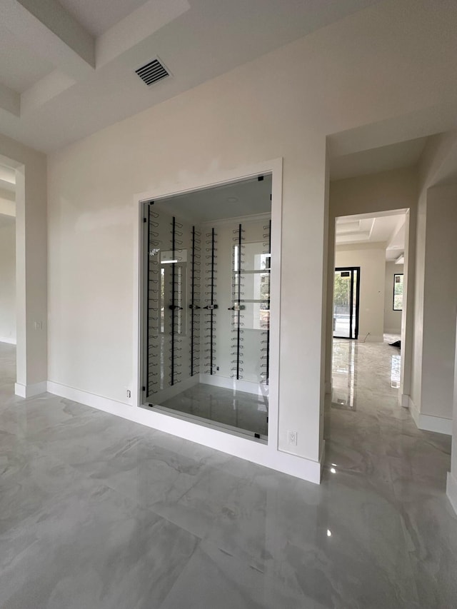 12850 152nd St N, Jupiter, FL 33478 - wine area with baseboards, visible vents, and beam ceiling
