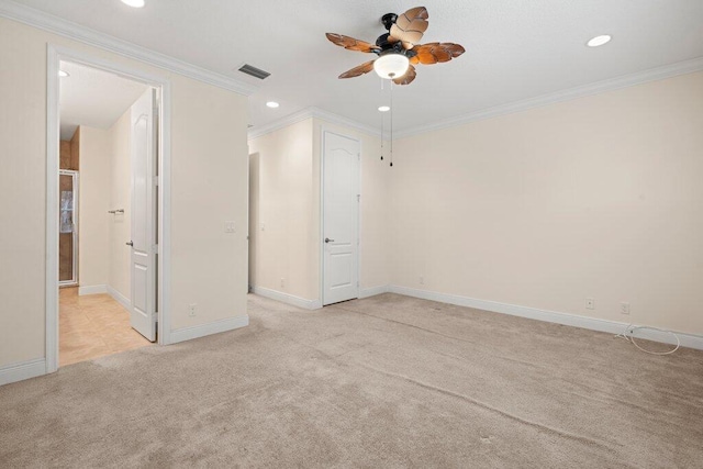 interior space featuring ceiling fan and crown molding