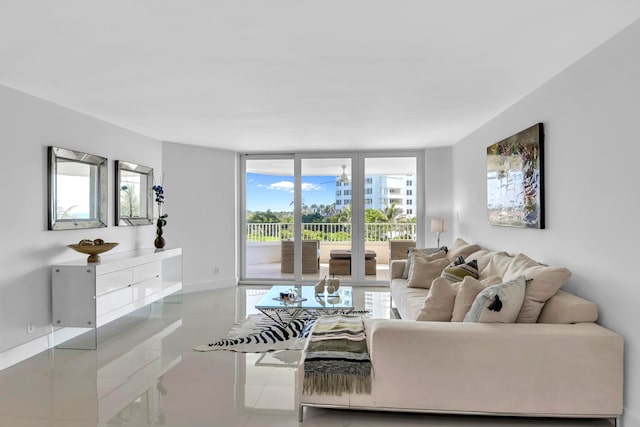 tiled living room with plenty of natural light