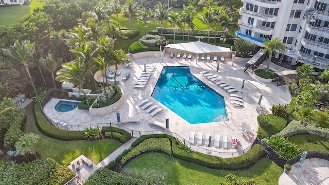 view of swimming pool featuring a patio