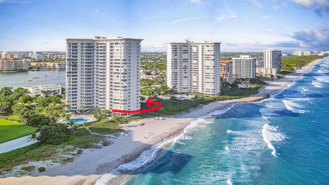 drone / aerial view with a view of the beach and a water view